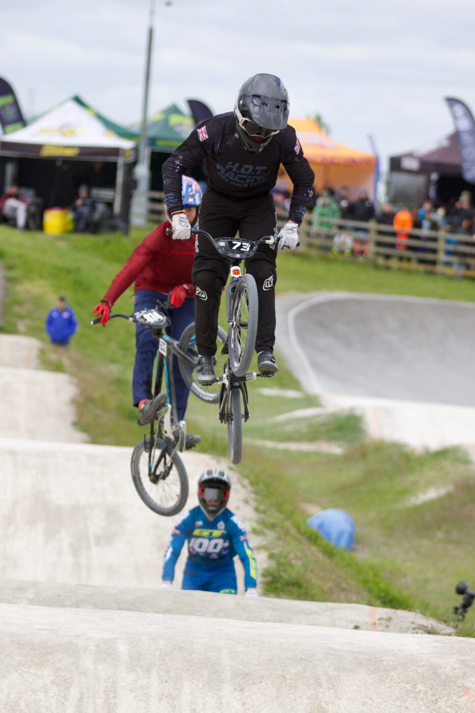 Year 12 student, Miller, is seen performing a stunt on his BMX bicycle on a race track during the National BMX Championships.
